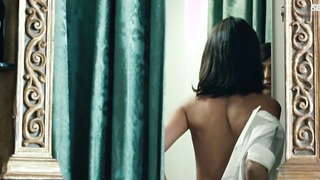 Olivia Magnani, Le conseguenze dell'amore (2004) filminde çıplak göğüsleri göstermişti.