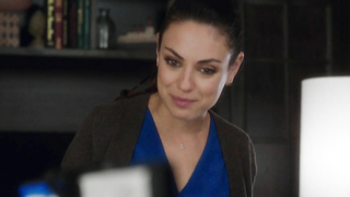 Leah Mckendrick in this short clip was seen wearing blue gown and black colored shrug over her body.