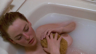 Nude video with Virginia Madsen nude , scene from Candyman (1992)