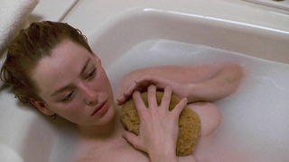 Nude video with Virginia Madsen nude , scene from Candyman (1992)